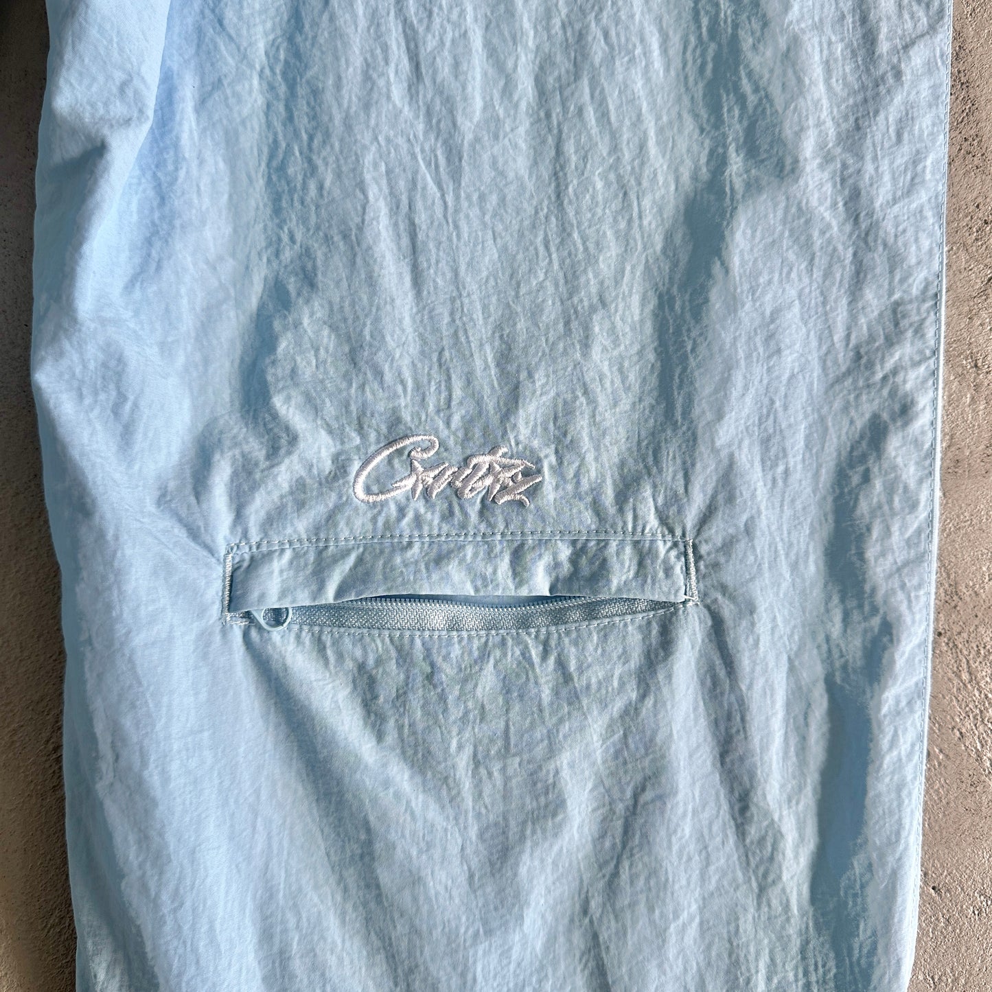 Conjunto Corteiz Corta Vento Azul - Shabby Company