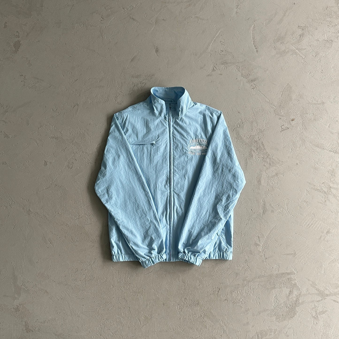 Conjunto Corteiz Corta Vento Azul - Shabby Company