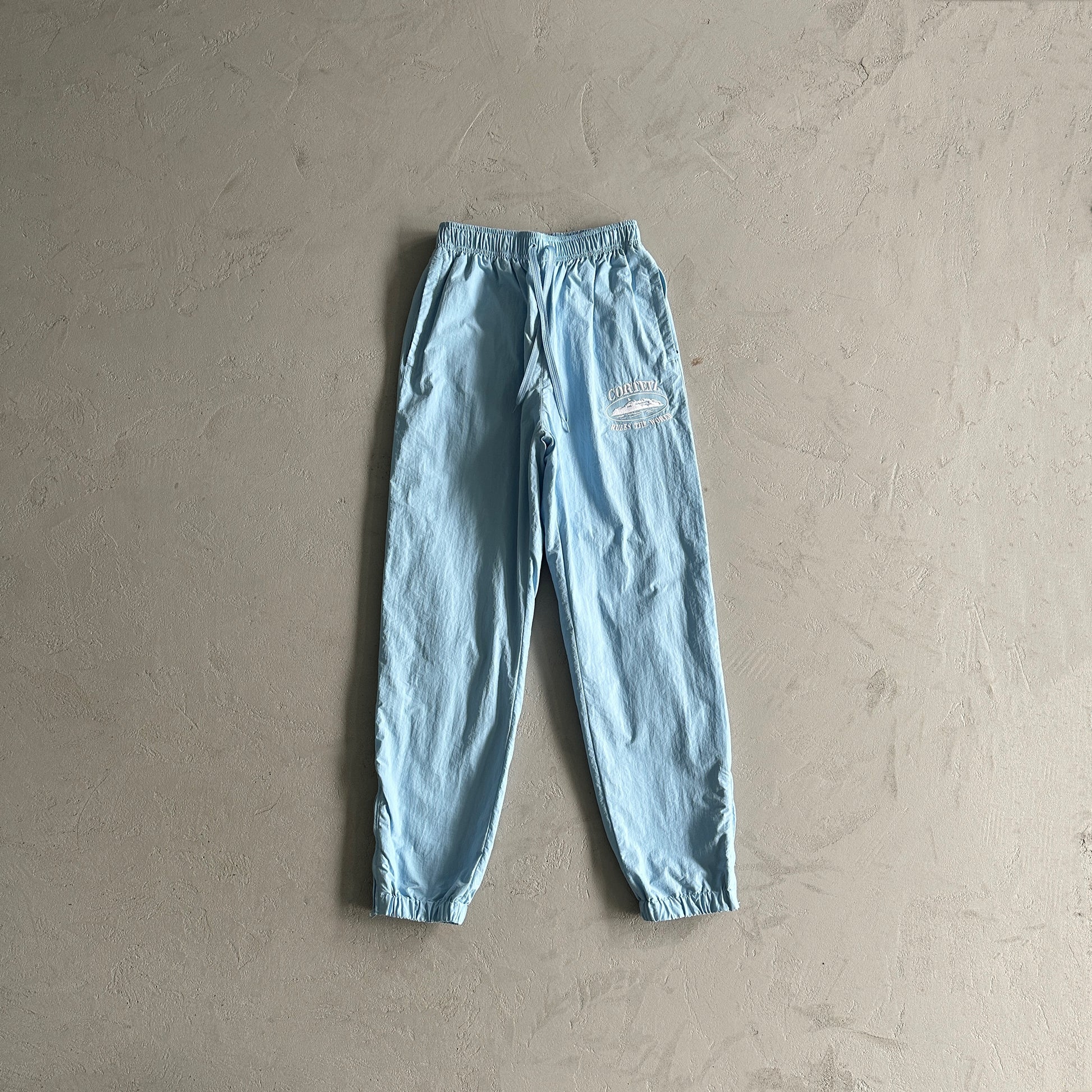Conjunto Corteiz Corta Vento Azul - Shabby Company